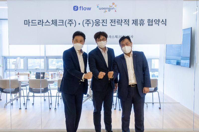 From left: Sang-yong Lee, Executive Director at Woongjin; Hak-jun Lee, CEO of Madras Check; and Yeon-kyung Choi, Executive Director at Woongjin
